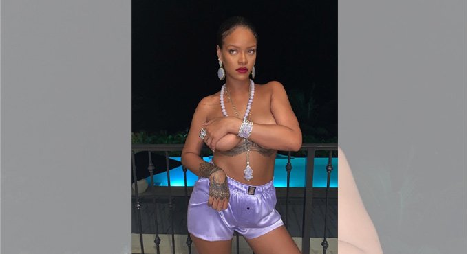 Rihanna goes topless wearing lord ganesha pendant locket