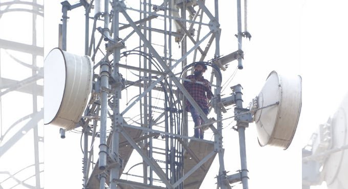 Youth climbs cell tower in karimnagar to protest against girlfriend’s